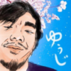 青い空と桜の花をバックにyujikunの顔が描かれたアイコン